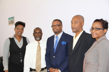 Health Minister in the Nevis Island Administration Hon. Mark Brantley (middle) flanked by members of the new Board of Directors of the Nevis Solid Waste Management Authority. (L-R) Ms. Kurlyn Merchant, Mr. Carlisle “Bingi” Pemberton, Chairman of the Board Mr. Bryan Gilfillan and Ms. Midge Morton. Absent is Board Secretary Mrs. Karen Claxton-Amory